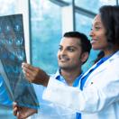 Healthcare workers looking at an X-ray Healthcare workers looking at an X-ray