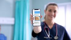 A nurse showing the Celo Health mobile app  A nurse showing the Celo Health mobile app