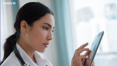 Healthcare worker using smartphone Healthcare worker using smartphone