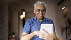 Person using tablet Person using tablet