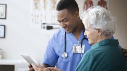 Doctor talking to patient Doctor talking to patient