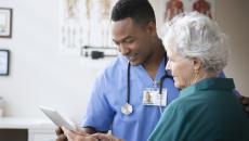 Doctor talking to patient Doctor talking to patient