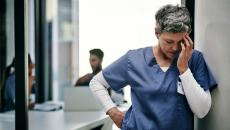 Depressed healthcare worker Depressed healthcare worker