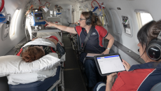 RFDS crews with an emergency patient on an aeromedical flight RFDS crews with an emergency patient on an aeromedical flight